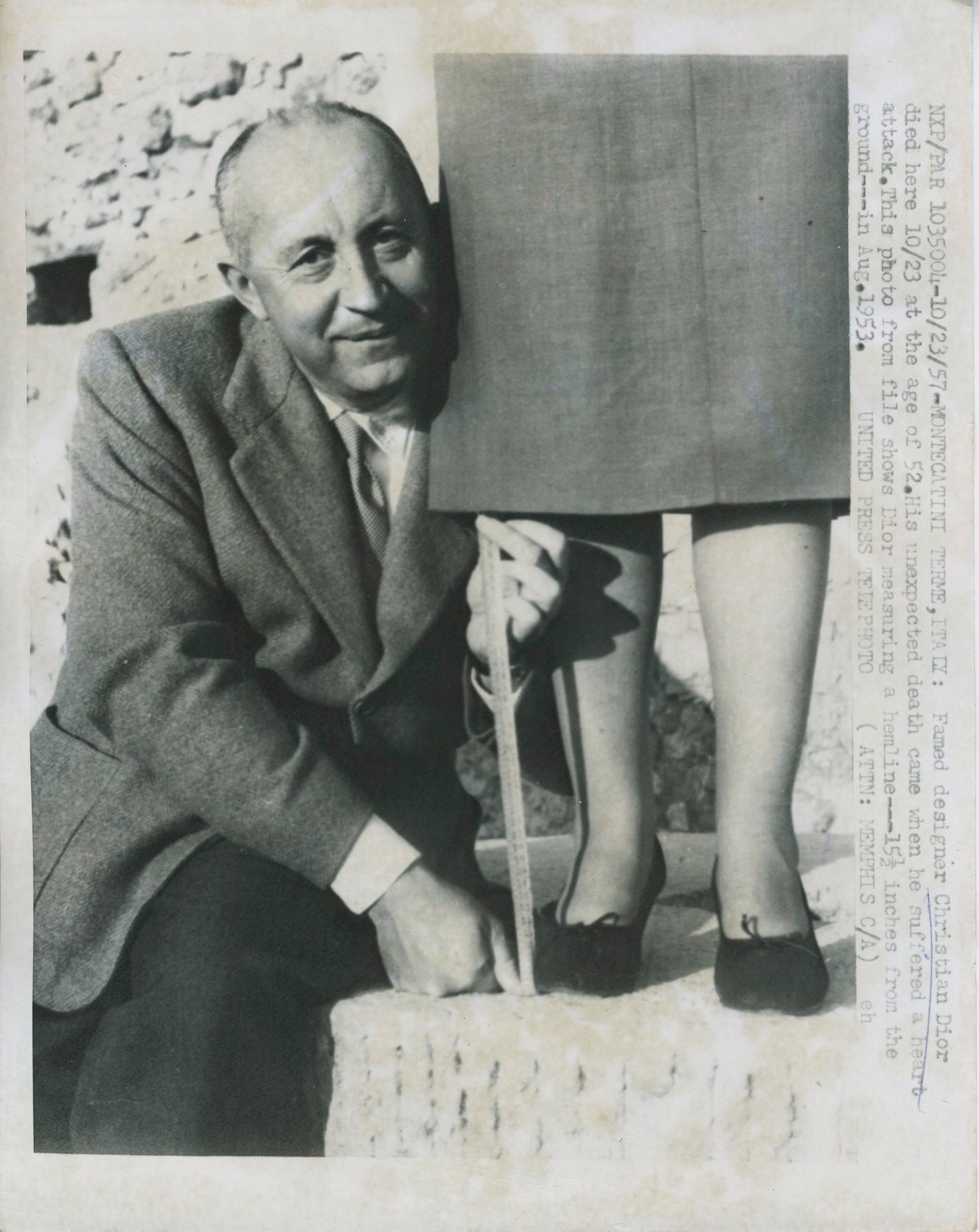 Dior Measures a hemline – 1953 Photograph published for Obituary United Press Telephoto press photograph