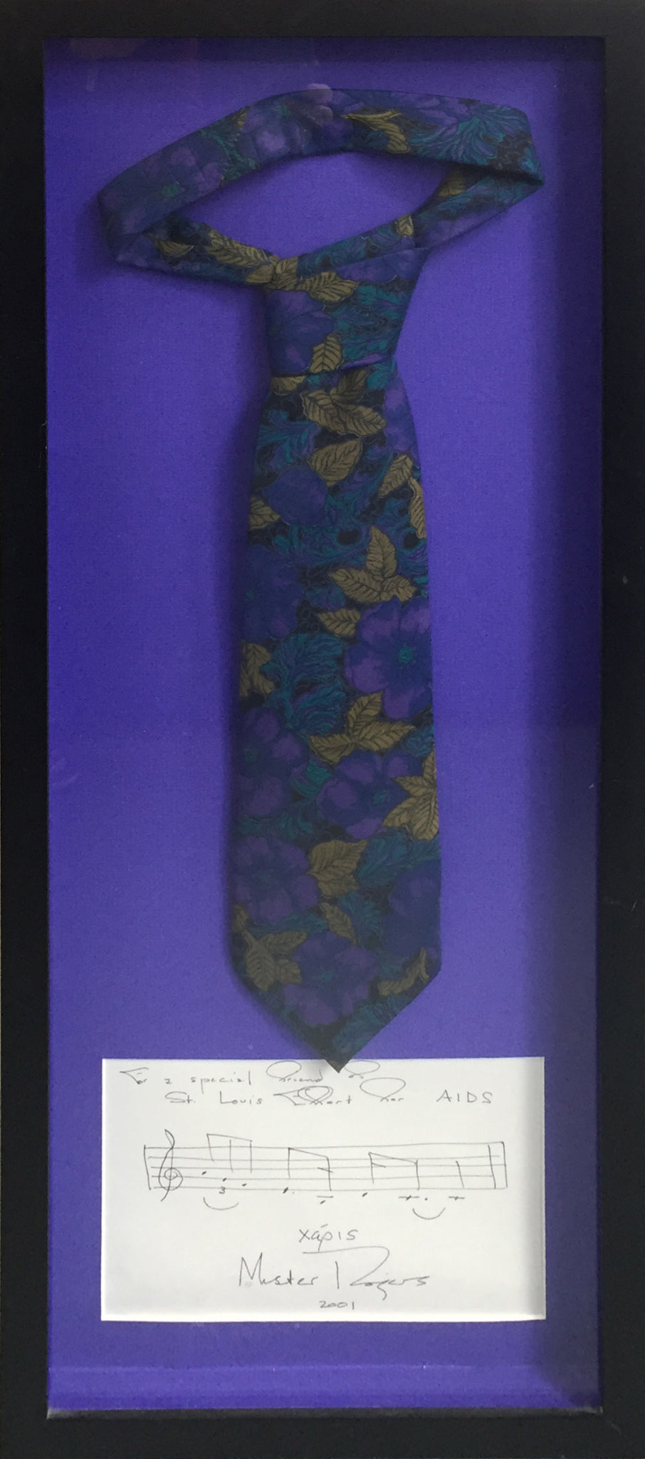 Rogers, Fred. (1928–2003)  Mister Rogers' Tie, with Autograph Musical Quotation from "Won't You Be My Neighbor"