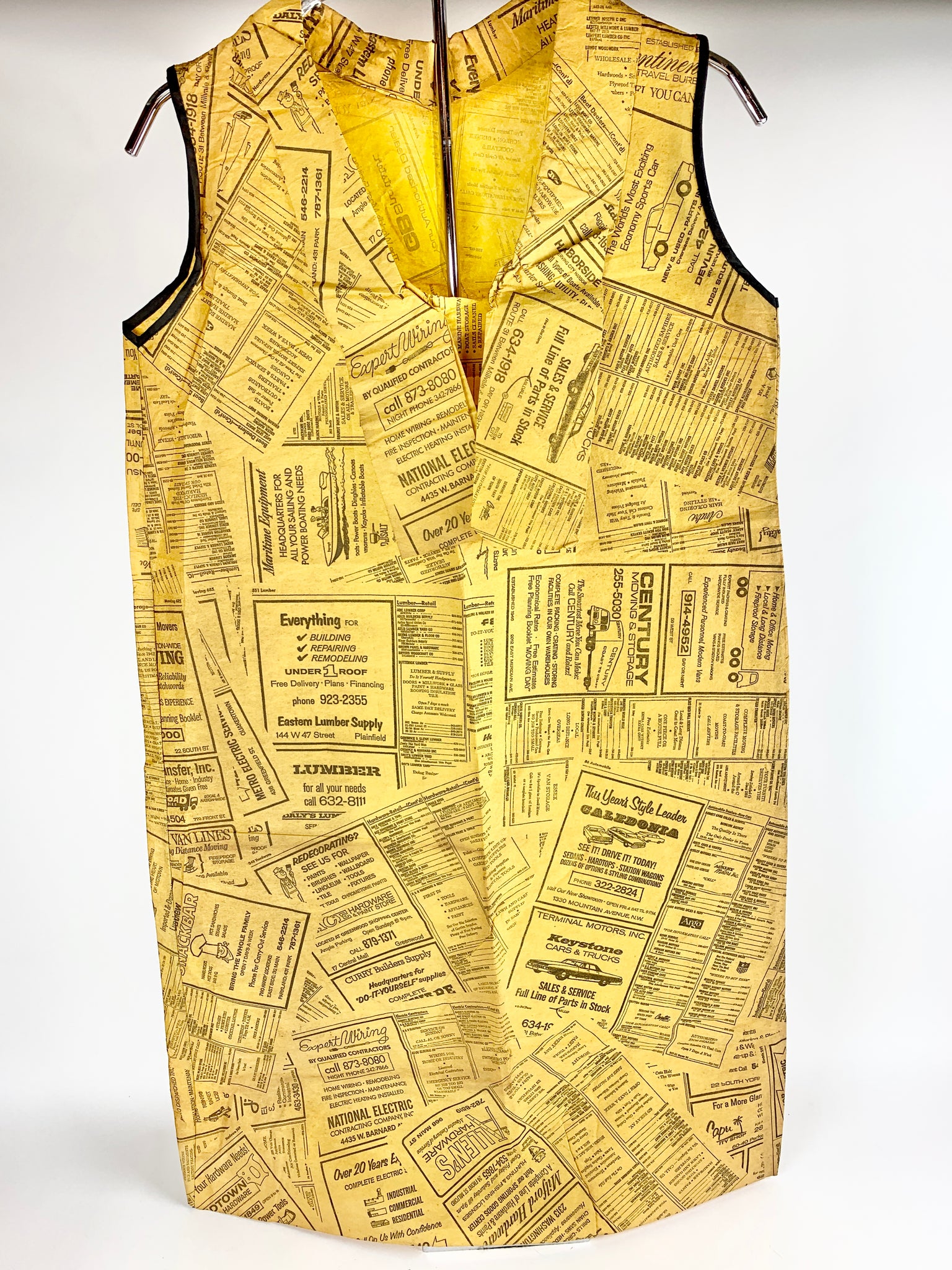 'Yellow Pages' Paper Dress Original 1960s paper dress with a printed pastiche design and tie collar