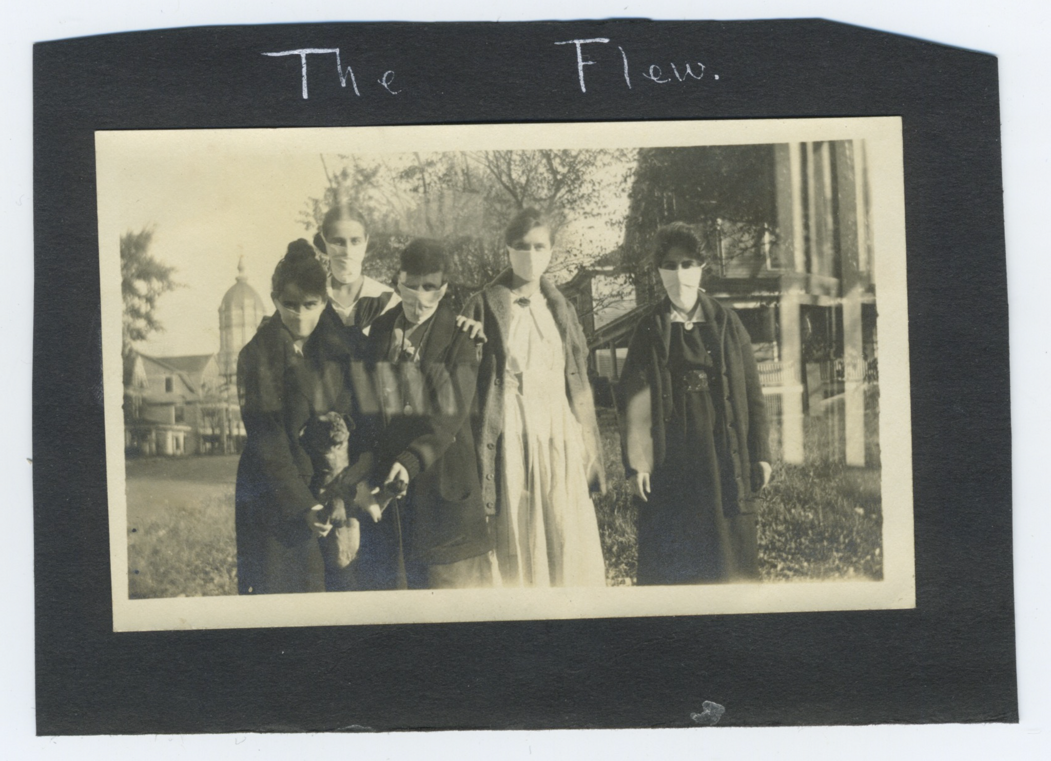 [Spanish Flu] Candid Photograph of Students Wearing Masks, inscribed “The Flew,” University of Missouri, 1918