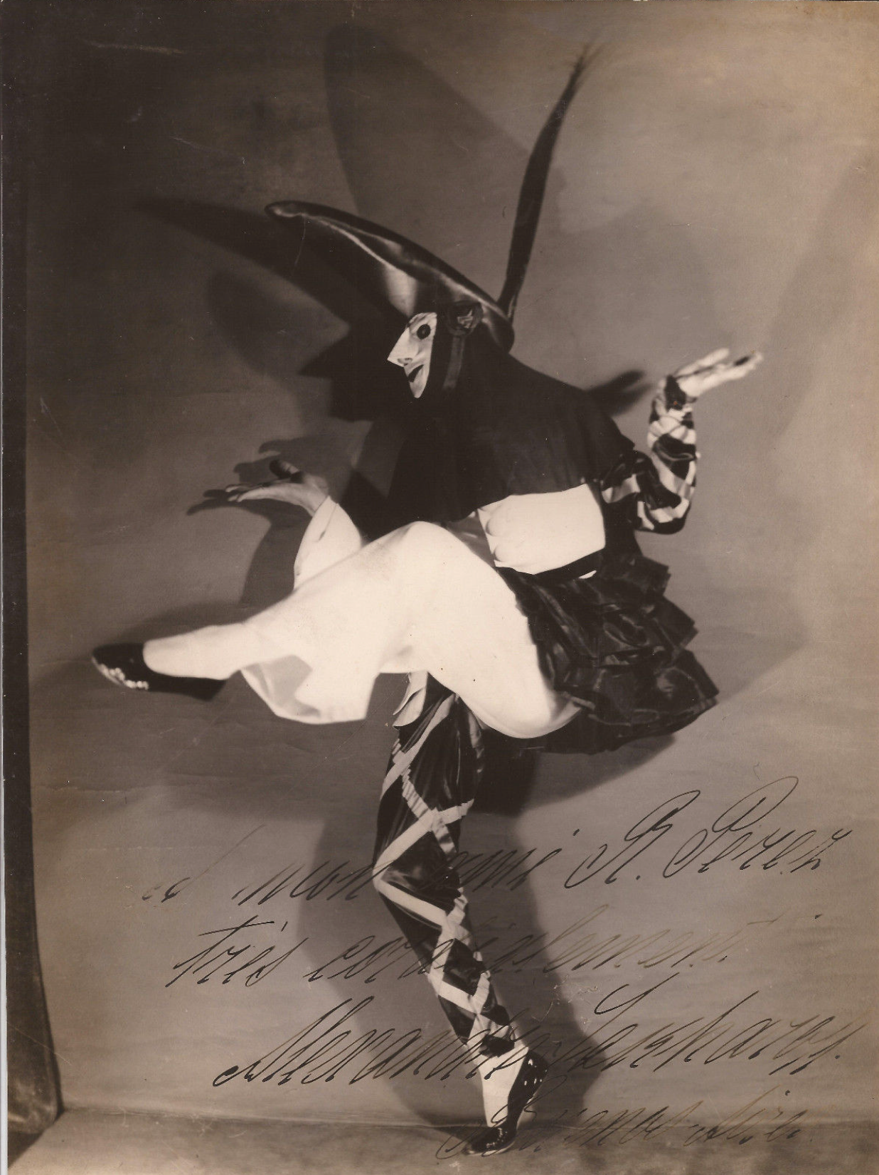 Sakharoff, Alexandre. (1886–1963) [Studio Iris]: Signed Photograph of the dancer in a Commedia dell’Arte-style costume, Paris, ca. 1935
