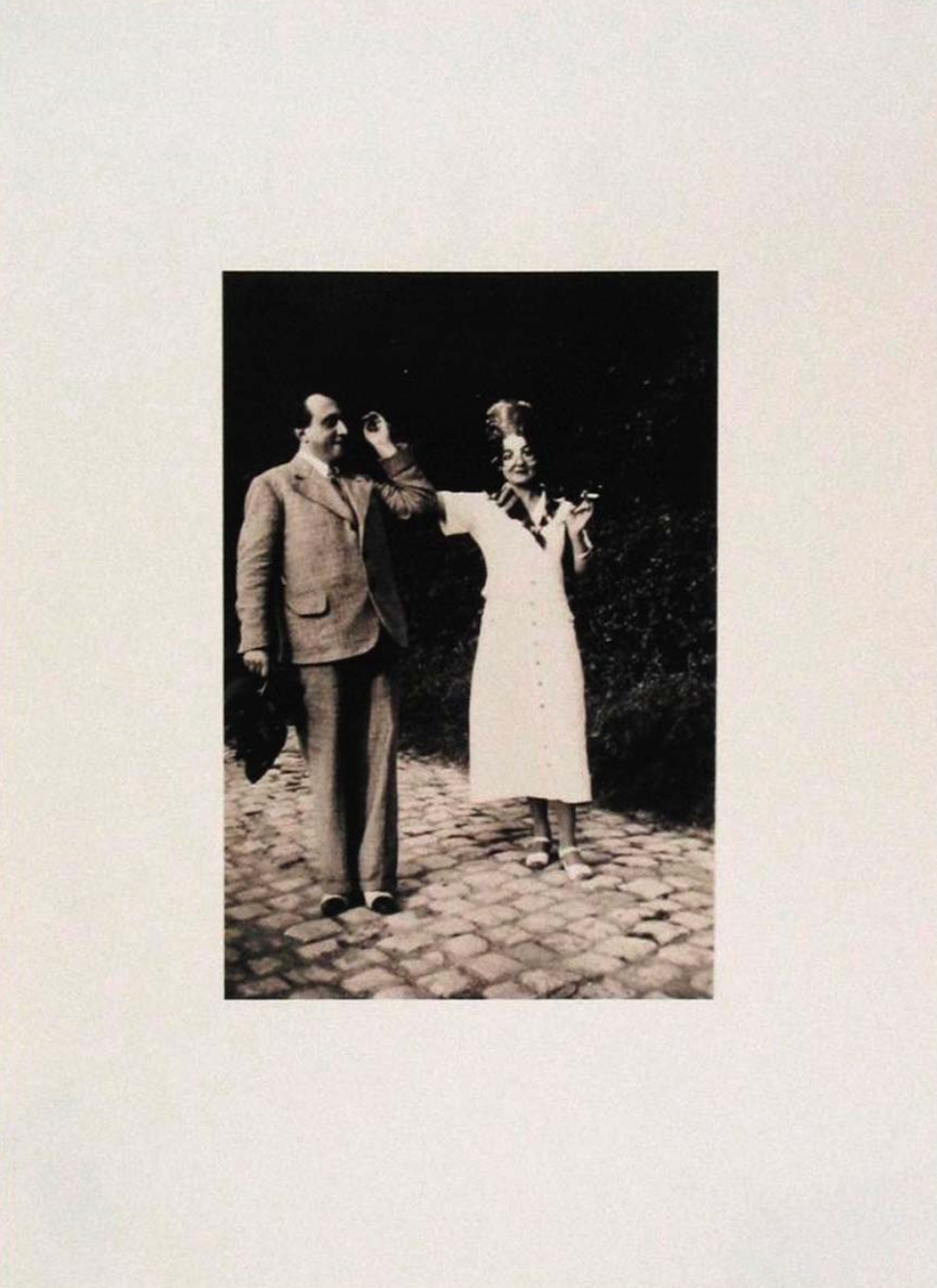 Magritte, René. (1898-1967): The Extraterrestrials V. Marcel Lecomte & Georgette in the garden at Rue Esseghem in Brussels, 1935 – Original Photograph.